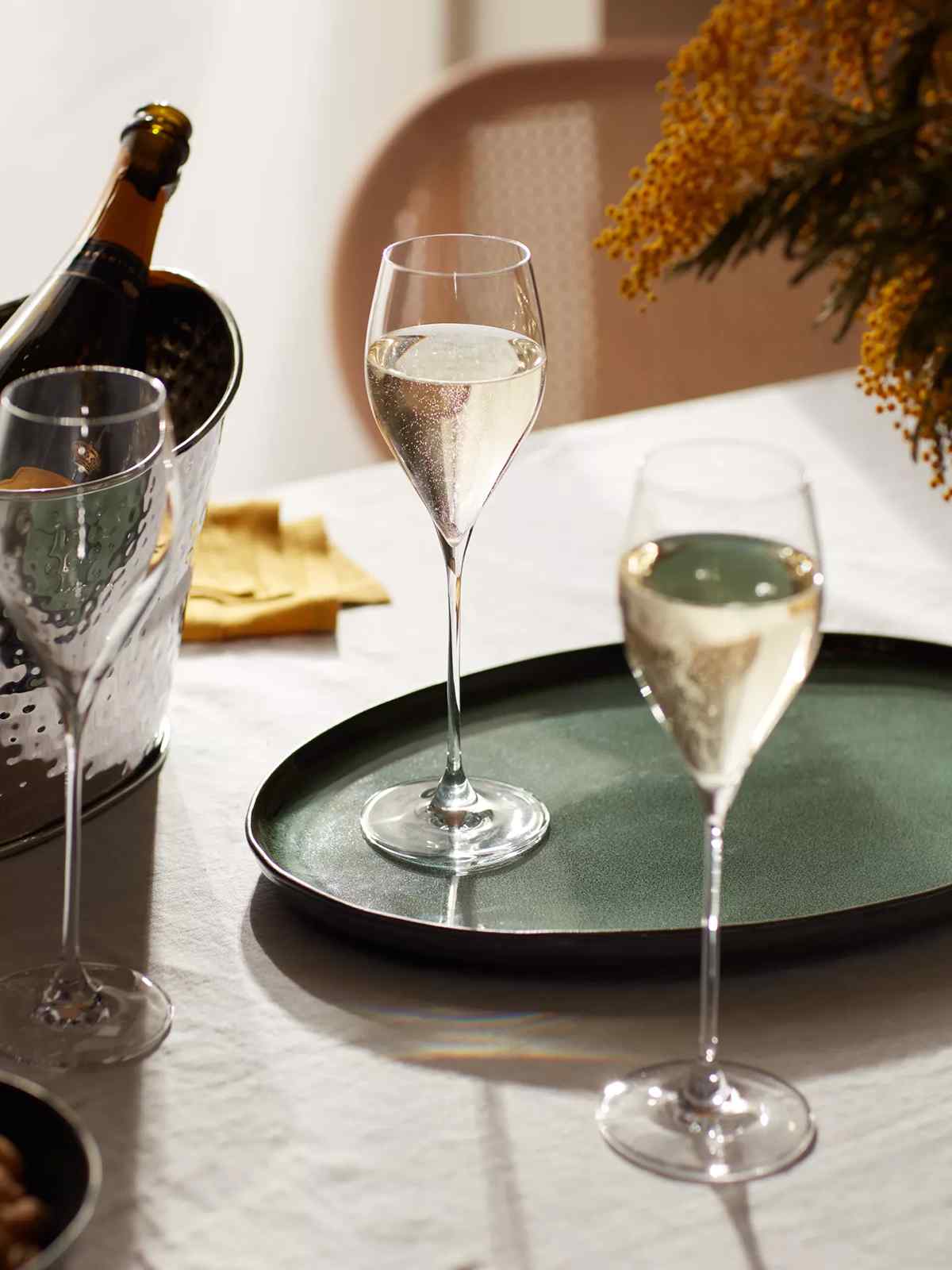 Three glasses of Italian sparkling wine on a tray