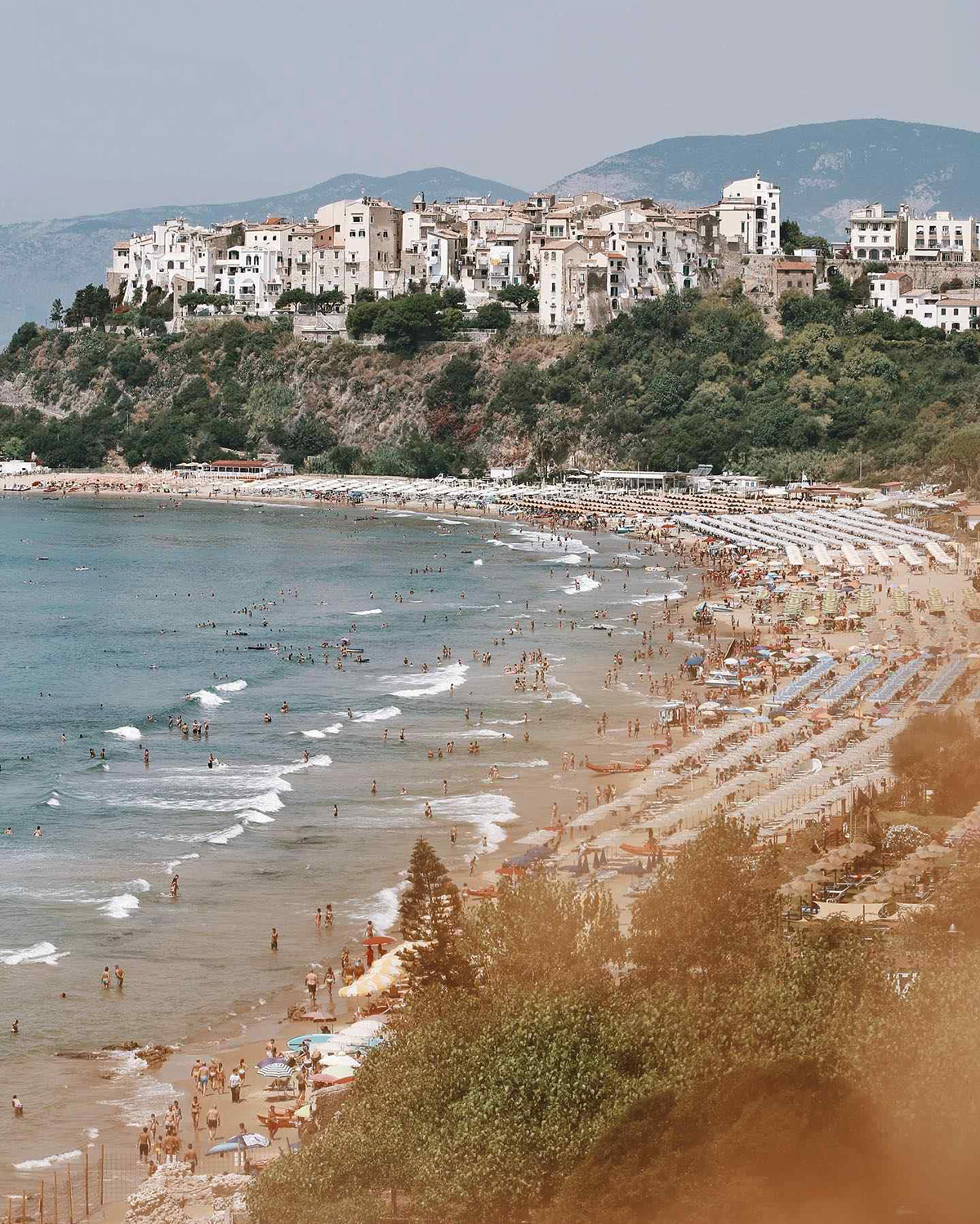 Beach in Italy with the town in the background