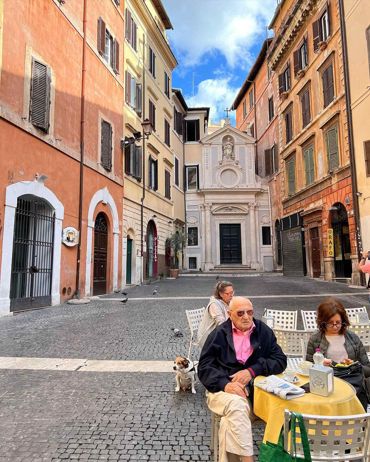 Two people sitting at a table in Rome, Italy